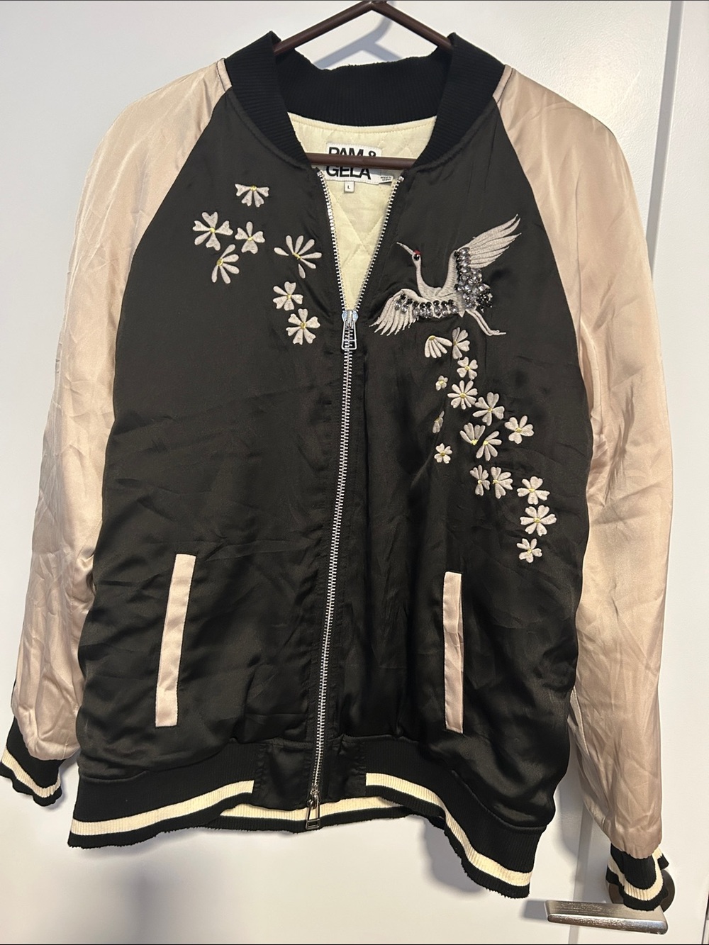 Pam & Gela Black Bomber Jacket with Blush Sleeves and Crystal Crane
